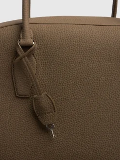 Borsa 15.75 India in pelle martellata
