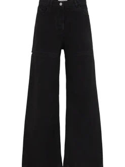 Jeans ampi in tela washed con cutout