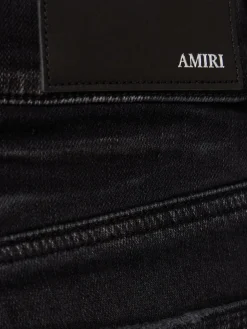 Jeans skinny ricamati Sinners