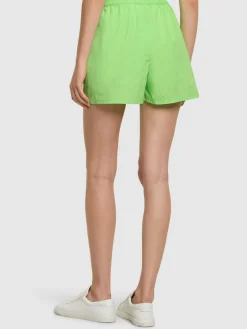 Shorts in nylon techno con logo